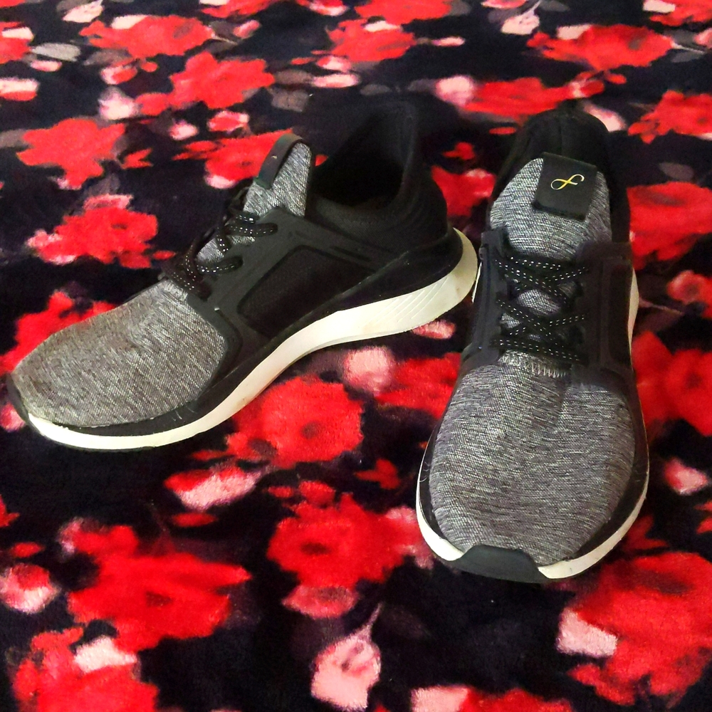Black and grey running shoes